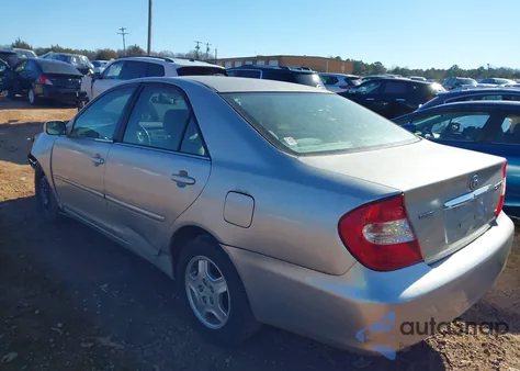 2003 Toyota Camry Le V6 z USA, uszkodzony, nr VIN 4T1BF32K53U057682